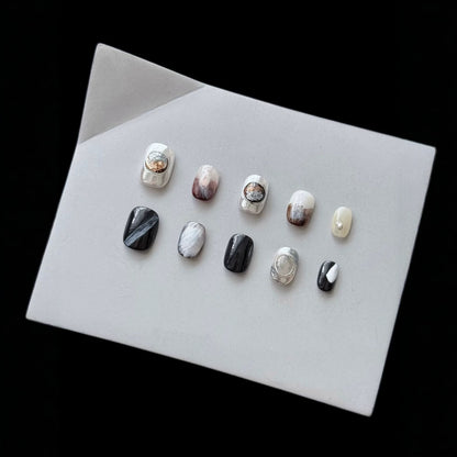Künstlerisches Press-On Nagel-Set mit eleganten Designs