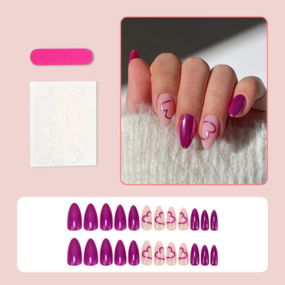 Kunstnagelset mit romantischem Herzdesign und glamourösen Akzenten Brehn