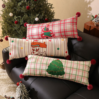 Langes dekoratives Lenden- und Nackenkissen im Weihnachts-Karo mit Pompon und Hund‑Baum‑Motiv Brehn