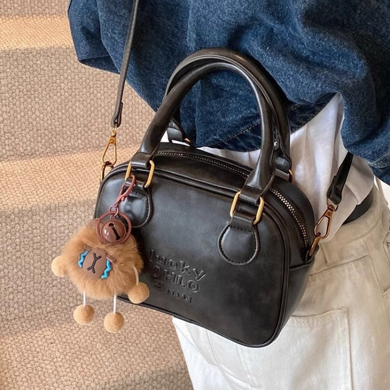 Schlanke strukturierte Mini-Schultertasche Brehn