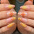 Kunstvolle Nagelspitzen mit floralen Motiven Brehn