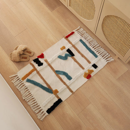 Gewebter Vorleger im Boho-Minimalstil mit kontrastiertem Tufting und Baumwollfransen Brehn