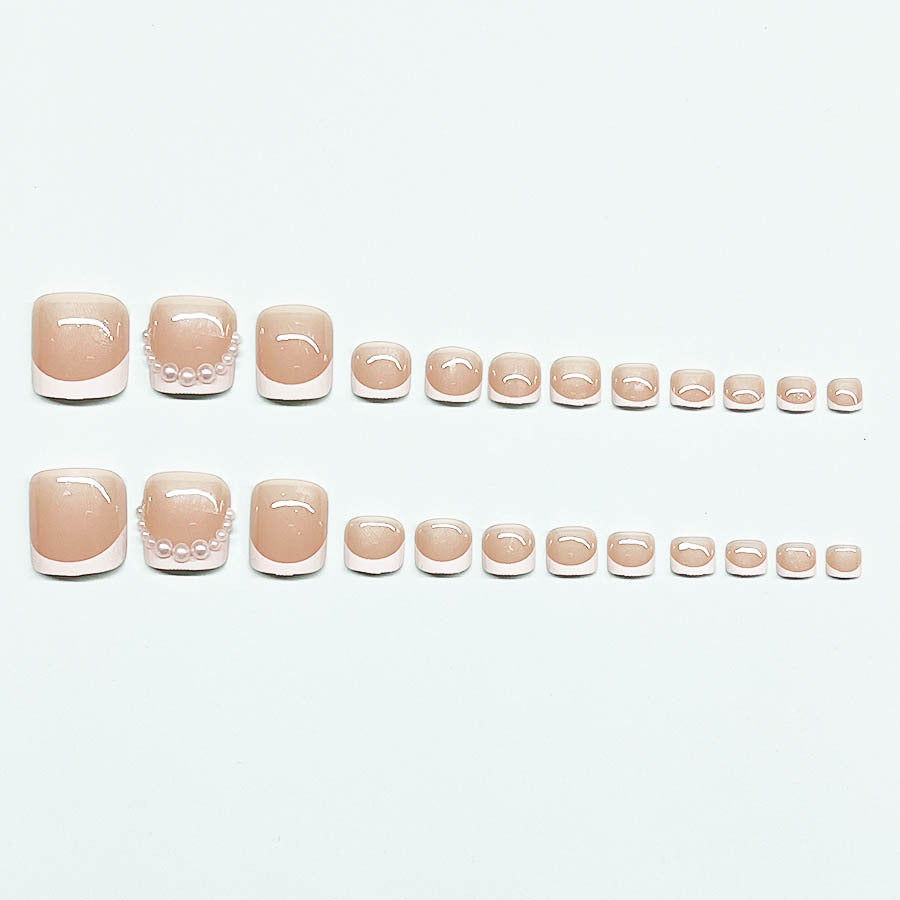 Kunstnagelset für Fußnägel mit eleganten Spitzenverzierungen Brehn