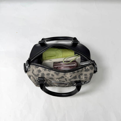 Zeitgenössische gemusterte Handtasche