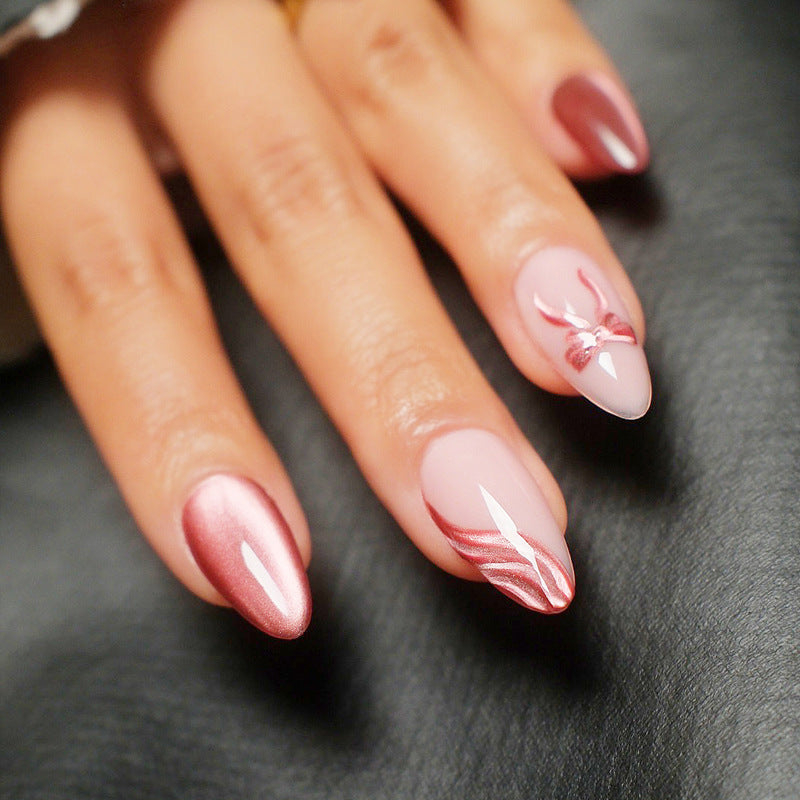 Dekorative Stiletto Press-On Nägel mit Schleifenakzenten Brehn