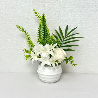Künstliche Blumenanordnung