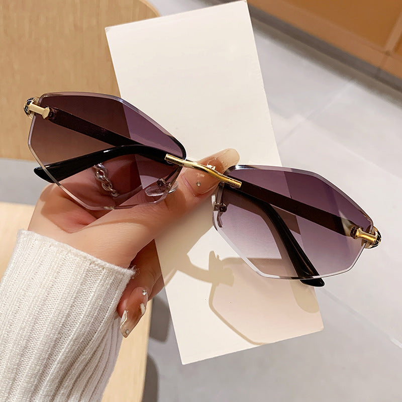 Damen Designer Sonnenbrille mit hexagonalem Rahmen und goldenen Akzenten Brehn
