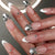Kunstnagelset mit eleganten Schmuckverzierungen Brehn