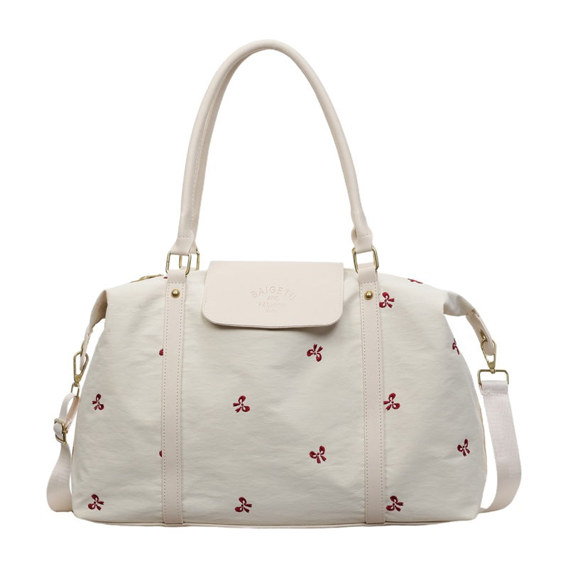 Stylische bestickte Reisetasche