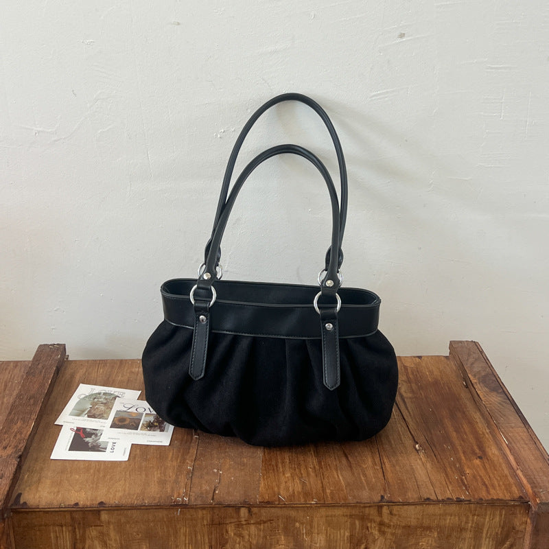 Geraffte Wildleder-Handtasche