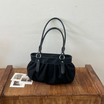 Geraffte Wildleder-Handtasche