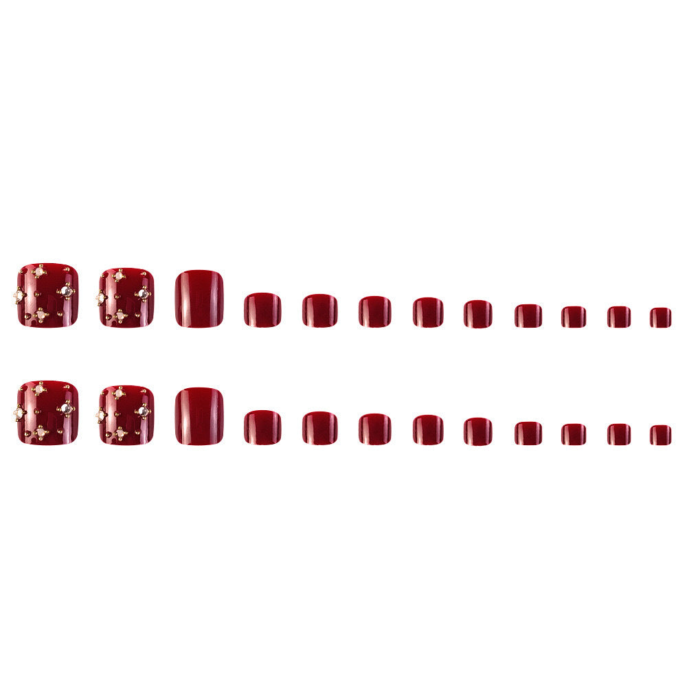 Fußnagelkunstset mit elegantem Design und Glitzerakzenten Brehn