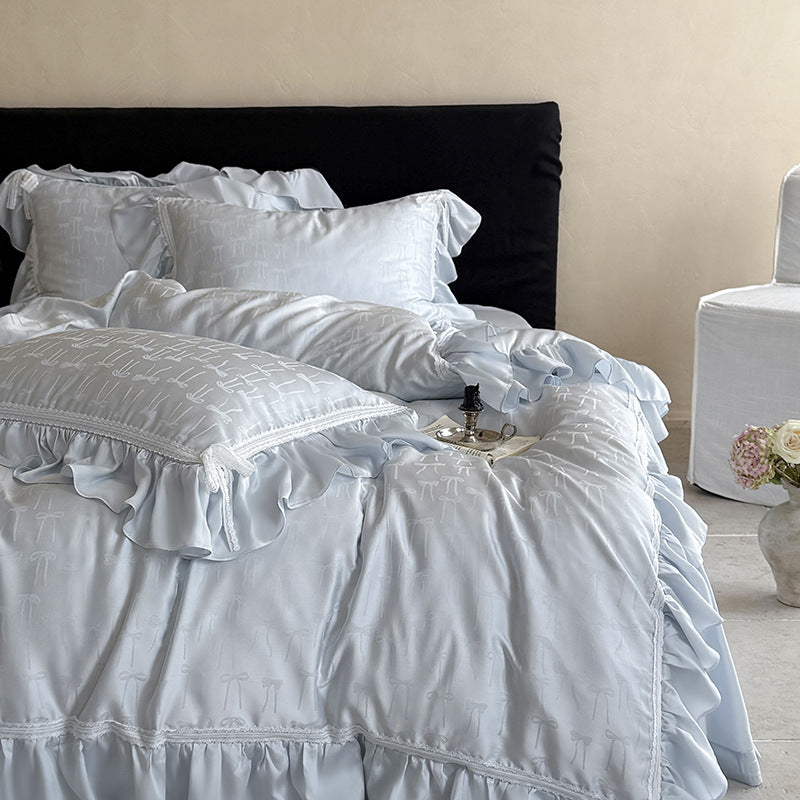 Luxuriöses Satin-Bettwäsche-Set mit Rüschen und feinem Schleifenjacquard
