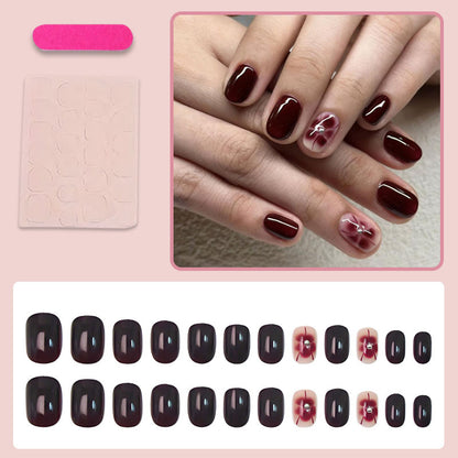 Kunstnagelset mit eleganten Blumendekoren Brehn