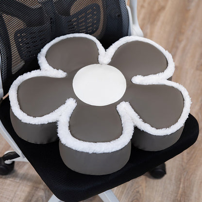 Gepolstertes Sitzkissen in Blumenform mit Kunstleder‑Mittelstück und flauschiger Randpolsterung
