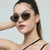 Damen geometrische Sonnenbrille mit elegantem Metallrahmen Brehn