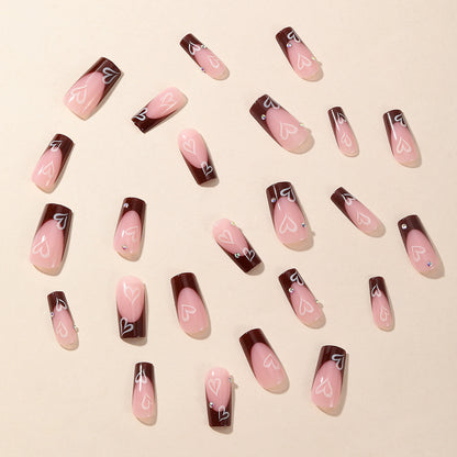 Kunstnagelset mit romantischen Herzmotiven Brehn