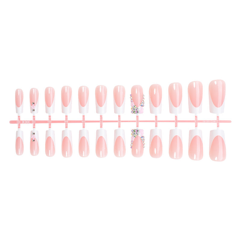 Dekoratives Press-On-Nagelset mit eleganten Akzentdesigns Brehn