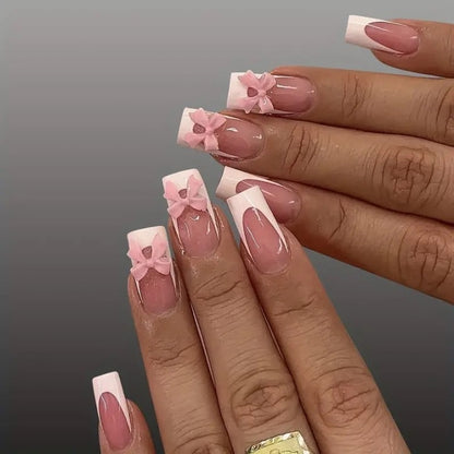 Kunstnagelset mit filigranen Schleifenverzierungen Brehn