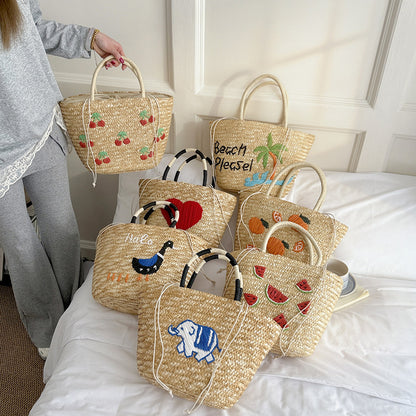 Bestickte Strohmärktasche