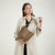 Texturierte Leder-Eimer-Tasche Brehn