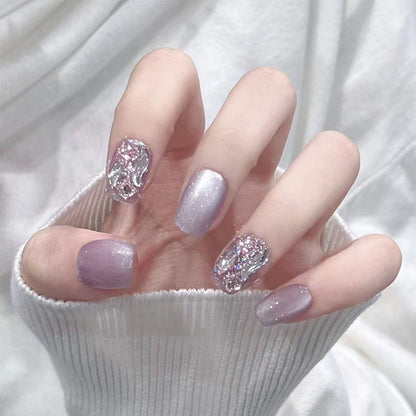 Kunstnagelset mit Glitzer- und Metallic-Effekten Brehn