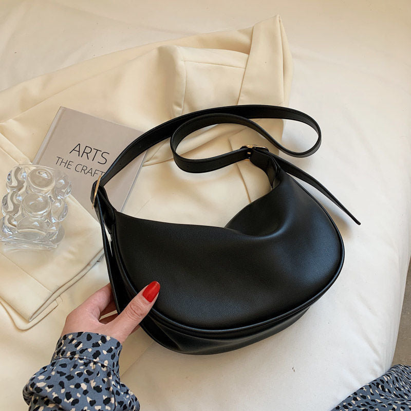 Elegante geschwungene Schultertasche Brehn