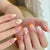 Künstlerisches Press-On-Nagelset mit floralen und Ombre-Designs Brehn