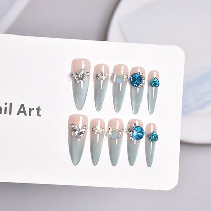 Glamouröse Stiletto-Nagelerweiterungen mit Kristallen Brehn