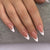 Elegante Stiletto Press-On Nägel mit elegantem französischen Tippdesign Brehn