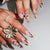 Künstlerisches Press-On-Nagelset mit floralen und Tierprint-Designs Brehn