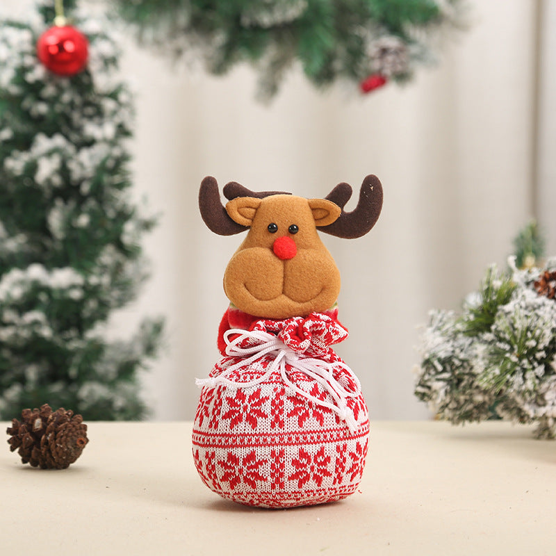 Niedlicher Weihnachtsgnom mit Geschenkesack Brehn
