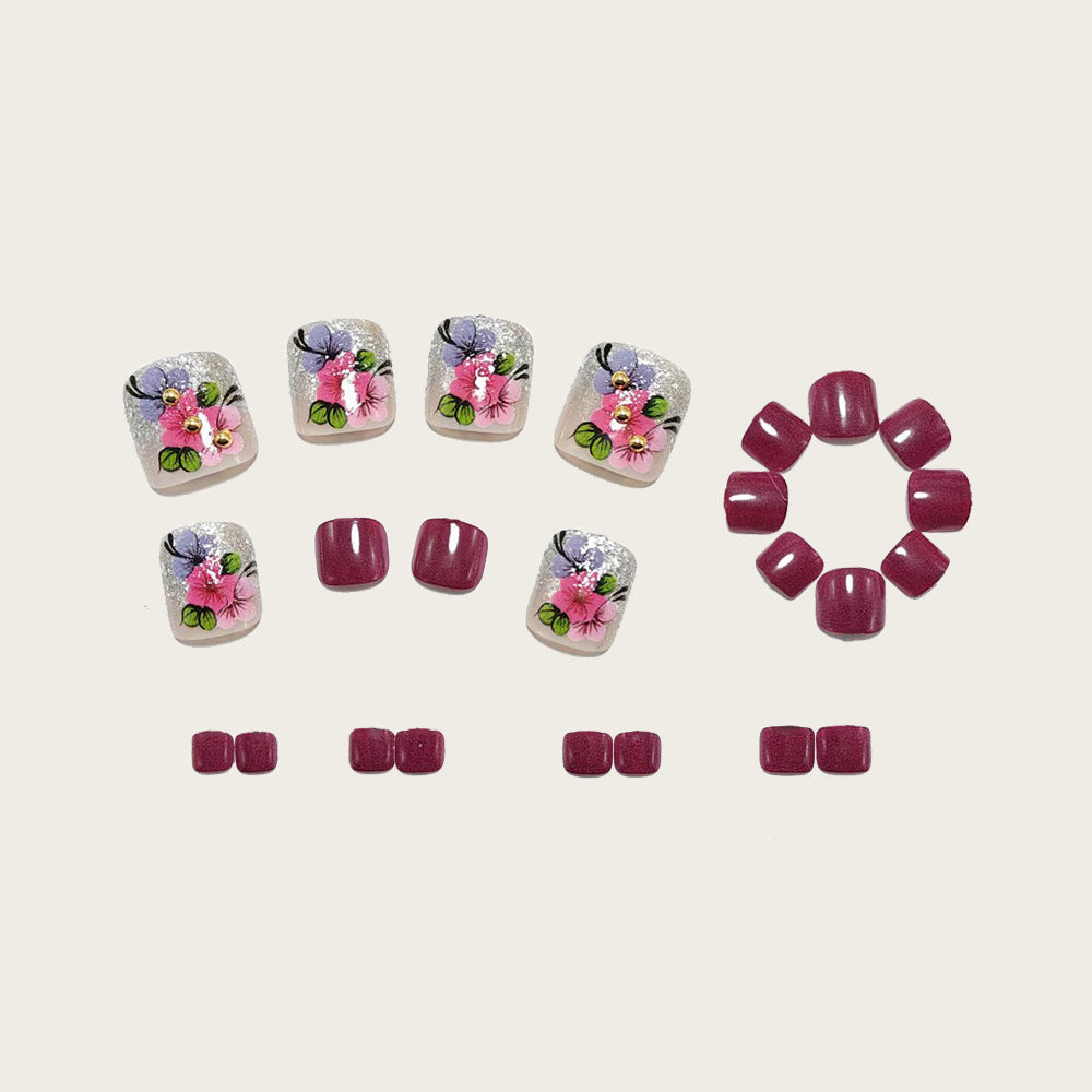 Kunstnägel mit Floralen Designs und Glitzereffekten Brehn