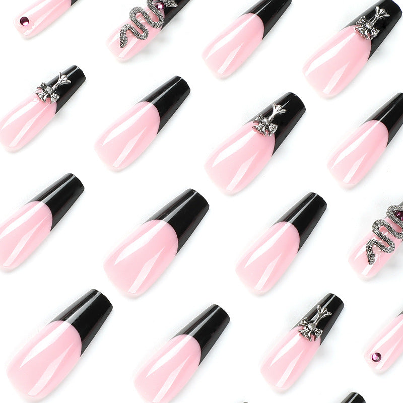 Kunstvolle Stiletto-Nägel mit Glitzer-Akzenten und Kreativdesign Brehn