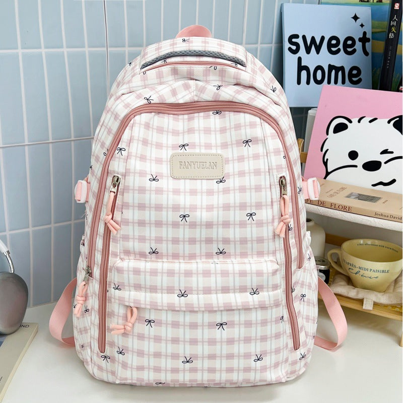 Süßer Rucksack mit Schleifenmuster