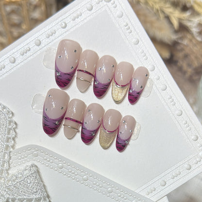 Künstlerisches Stiletto Press-On Nagelset mit Strassakzenten Brehn