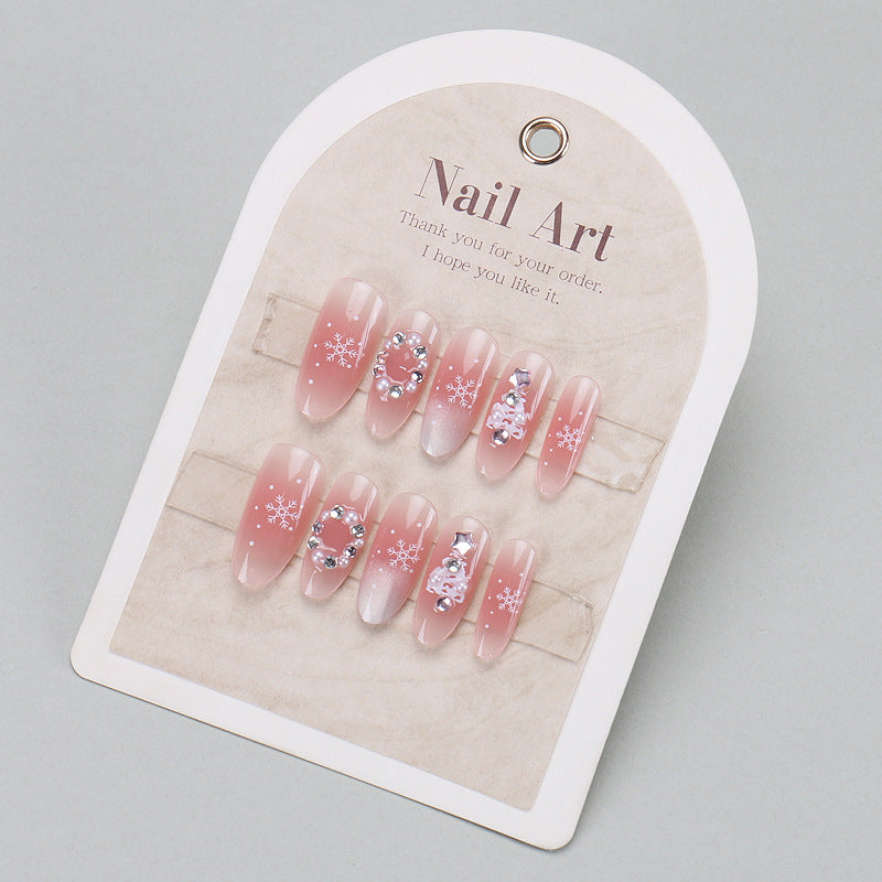 Elegantes Press-On-Nageldesign mit Strassakzenten Brehn