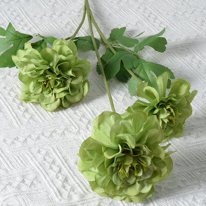 Künstliches Blumenarrangement mit Ringelblumen