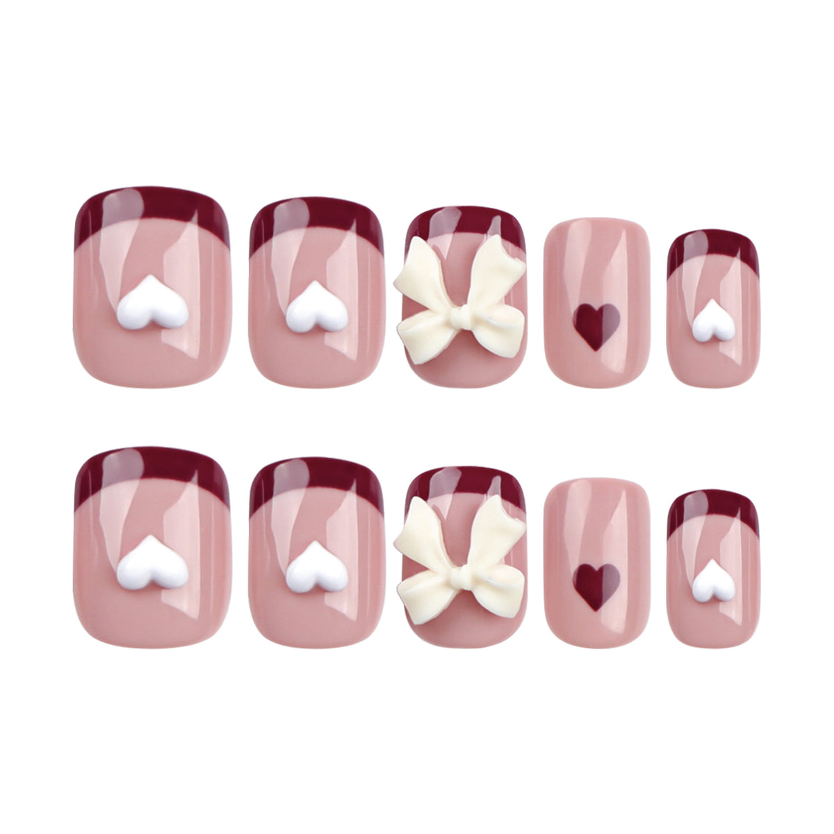 Kunstvolle Nagelkunst mit Herz- und Schleifenmotiven Brehn