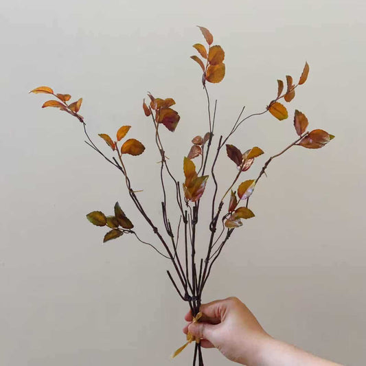 Lebensechte dekorative Zweigarrangement