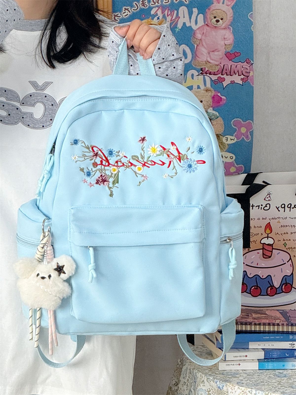 Blumenbestickter Schulrucksack