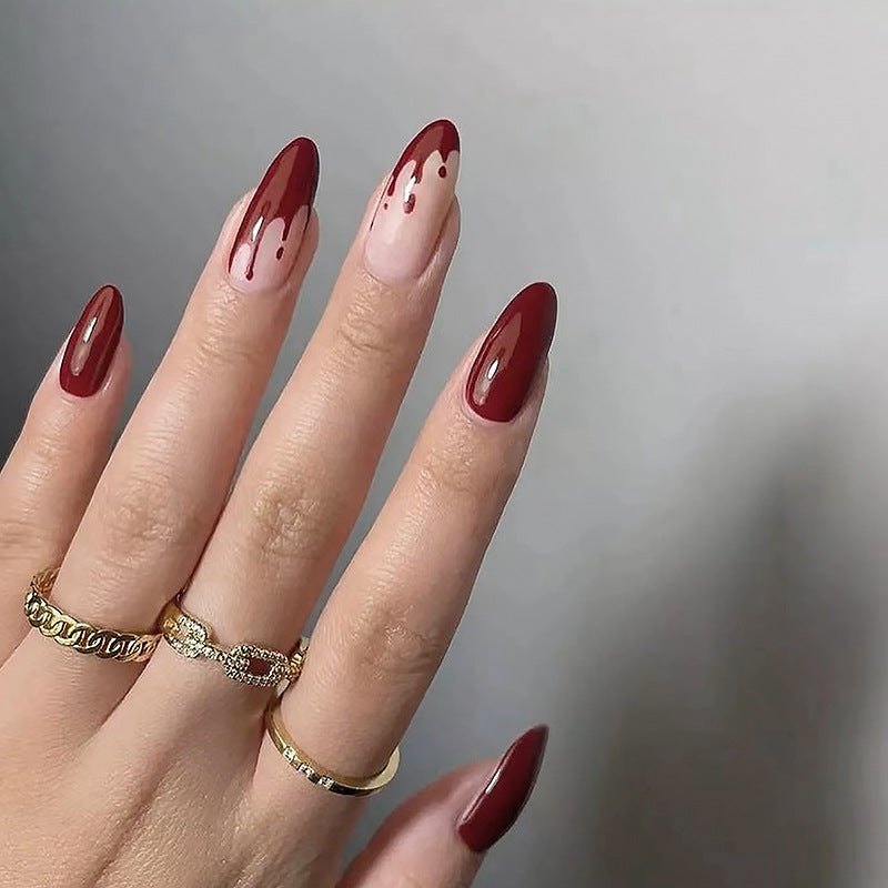 Kunstvolle Nagelspitzen mit Tropfen-Design Brehn
