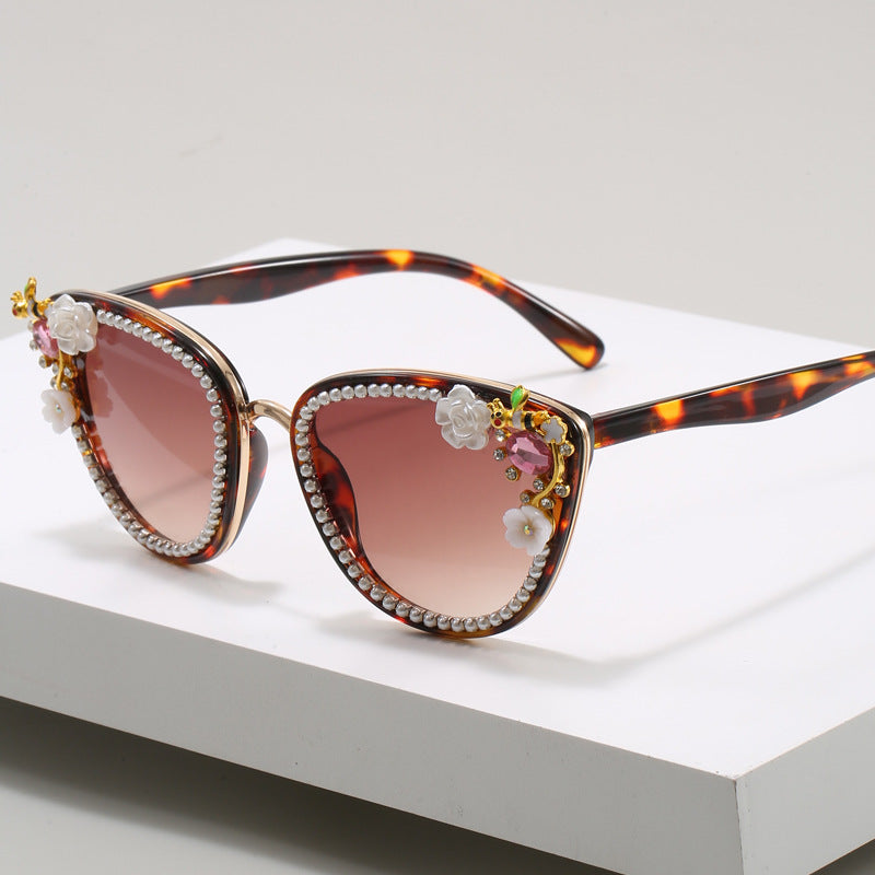 Damen Glamouröse Cat-Eye Sonnenbrille mit floralen Verzierungen Brehn