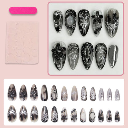 Künstliche Nagelspitzen mit glamourösem Schwarz-Weiß-Design Brehn