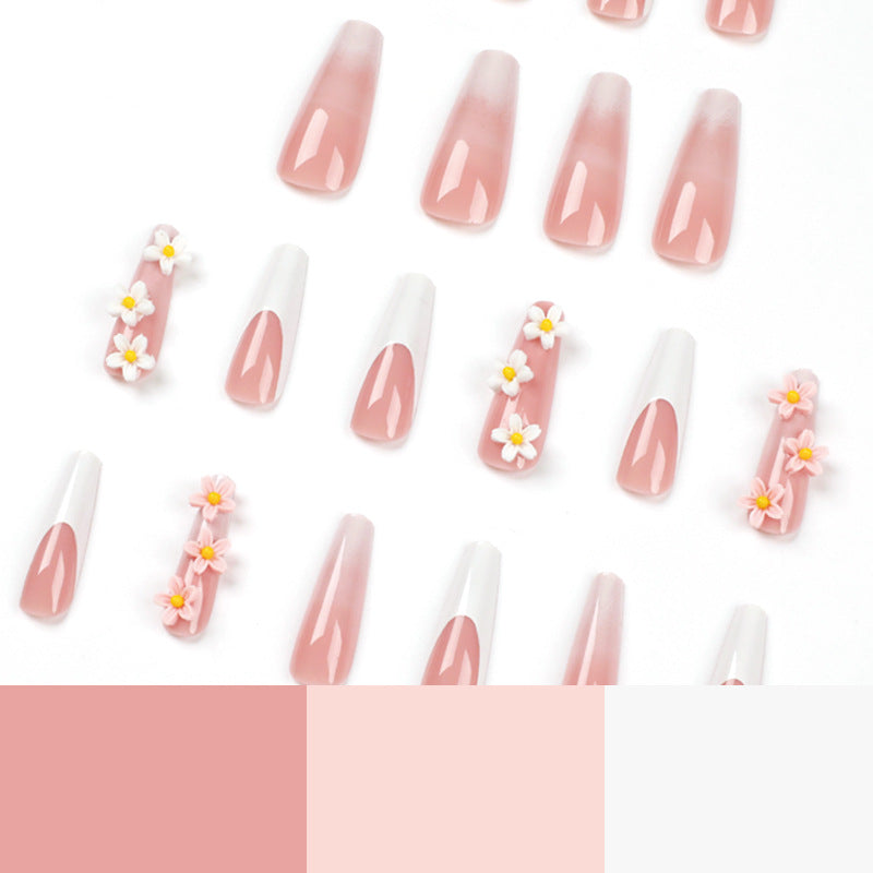 Kunstvolle Nagelverlängerungen mit elegantem Farbverlauf und kreativen Blumenakzenten Brehn