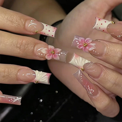 Künstlerisches Press-On Nagel Kunstset mit floralen Designs Brehn