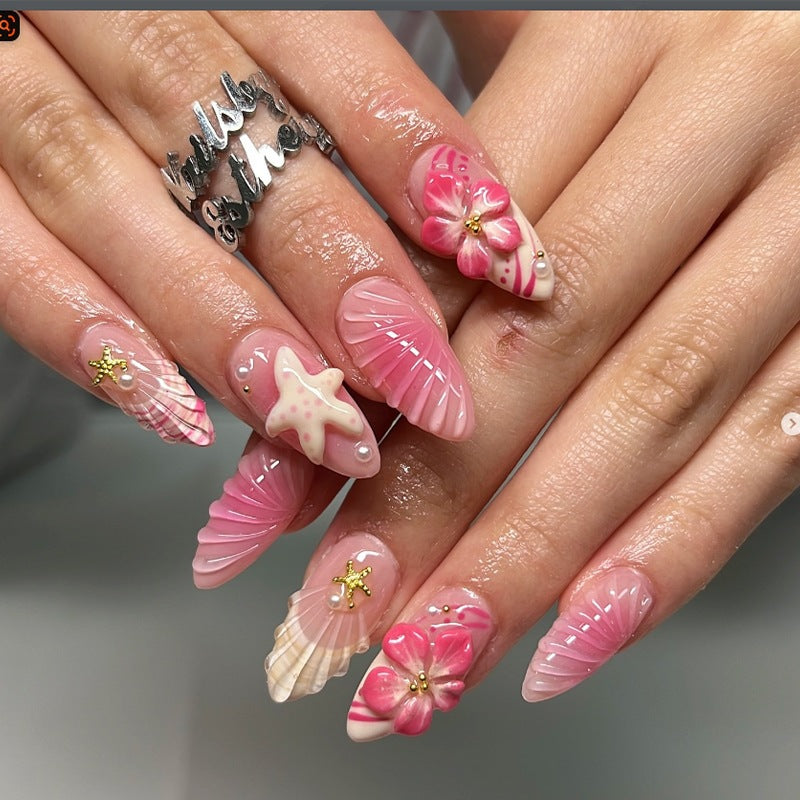 Kunstnagelset mit maritimem Muschel- und Blumenmotiv Brehn