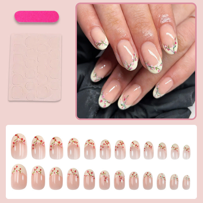 Kunstnagelset mit zarten Rosenakzenten Brehn