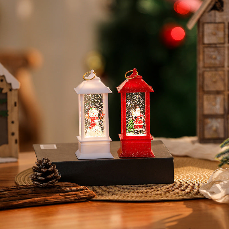 Beleuchtete Weihnachtslaterne mit glitzerndem Schneemann-Szenario Brehn