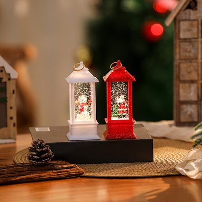 Beleuchtete Weihnachtslaterne mit glitzerndem Schneemann-Szenario Brehn